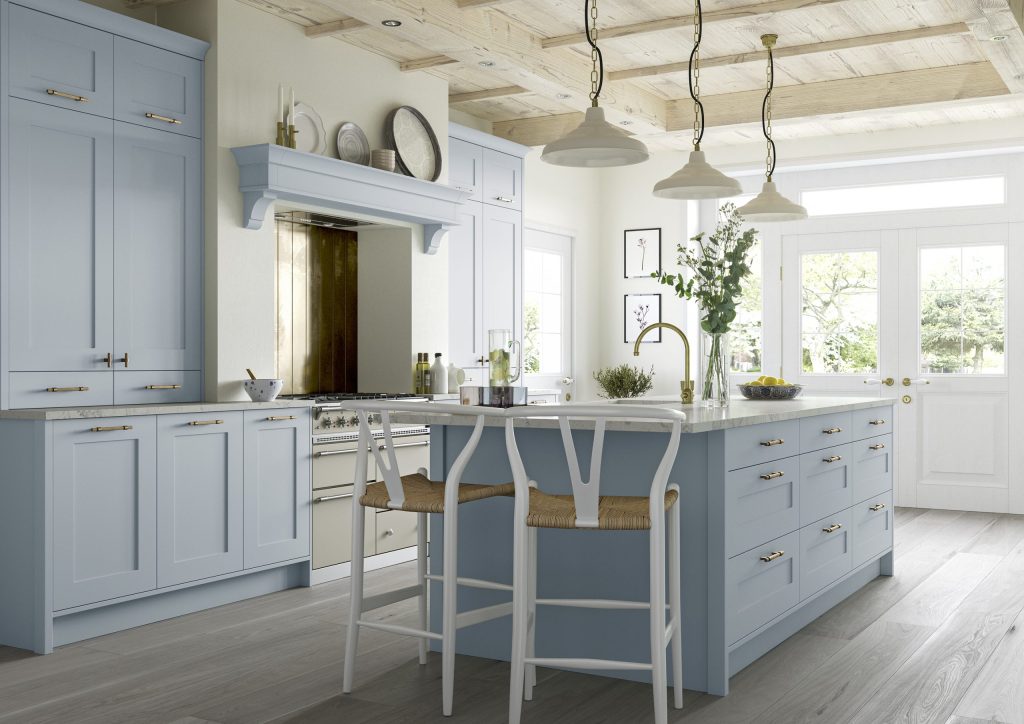 Light blue shaker kitchen with central island, timber ceiling beams and pendant lighting