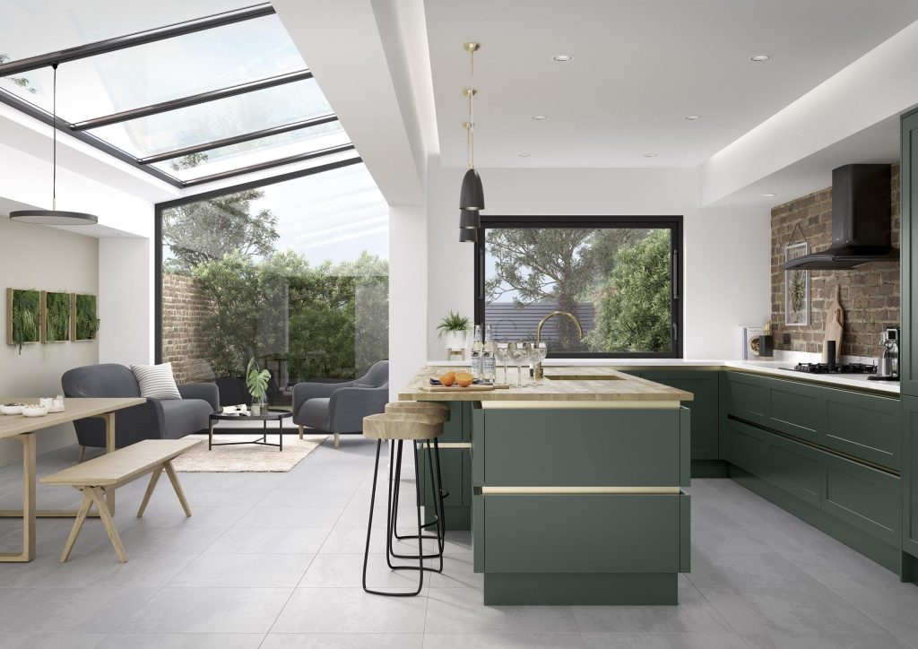 Open plan kitchen diner with sage green island, oak bar stools and full-width lantern roof
